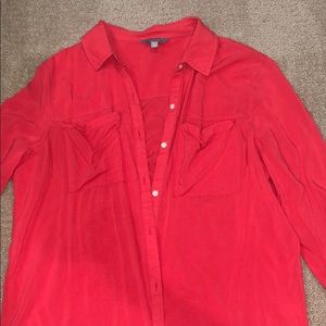 Coral colored long sleeved blouse